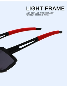 Detail of lightweight frame with red anti-slip silicone tips on cycling sunglasses