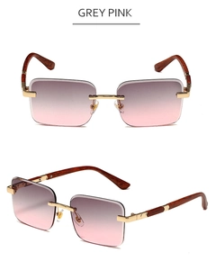 Detail of rimless square sunglasses with grey pink gradient lenses and wood grain temples