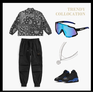 Blue coated sports sunglasses shown with trendy jacket and streetwear accessories