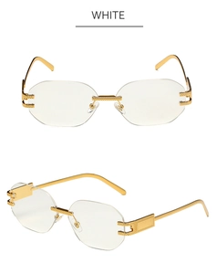 Macro detail of rimless octagonal sunglasses showing gold metal hinges and diamond texture