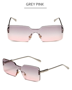 Detail view of grey pink gradient rimless sunglasses with silver metal temples