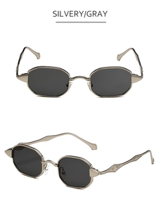 Detail view showing silvery metal frame and gray geometric lenses of vintage sunglasses