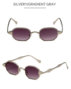 Detail of silver geometric relief on temples and purple gradient lenses of retro sunglasses