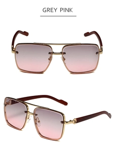 Vue détaillée des lunettes de soleil carrées avec verres dégradés gris rose et branches bois