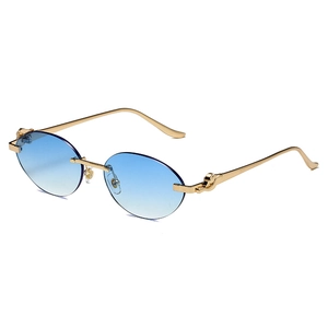 Lunettes de soleil ovales sans monture, verres dégradés bleus et détail guépard