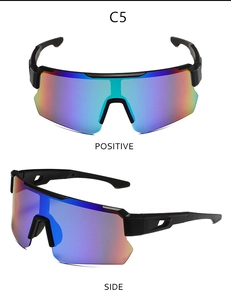 Detail view of sports sunglasses featuring blue-purple gradient lenses and black half-frame