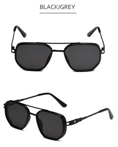 Close-up of black and grey double bridge aviator sunglasses with metal and acetate frames