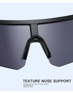 Detail of ergonomic matte black nose pads on UV400 cycling sunglasses for comfort