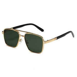 Classic metal pilot sunglasses with gold frame and green lenses at 45-degree angle