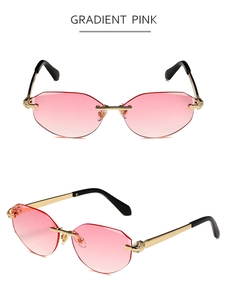 Close-up of rimless polygon sunglasses with gradient pink lenses and leopard head detail