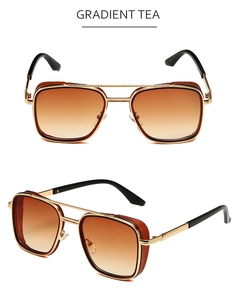 Detail view of steampunk aviator sunglasses with gold metal frame and gradient tea lenses