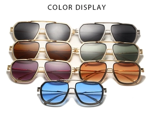 Dettaglio dei colori degli occhiali da sole aviator vintage con montatura in metallo e lenti