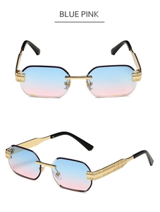 Detail of rimless rectangular sunglasses with blue-pink gradient lenses and gold metal temples