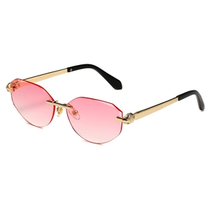 Rimless polygonal sunglasses with pink gradient lenses and gold leopard metal temples