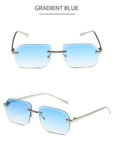 Vue détaillée de lunettes de soleil rectangulaires sans monture avec verres dégradés bleus