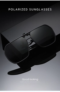 Gros plan de lunettes de soleil polarisantes à clip noir mat avec reflet élégant