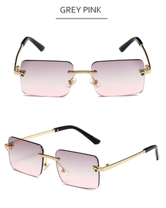 Detail of leopard head gold metal hinge and purple-pink gradient rimless lenses