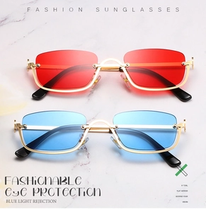 Detail of red and blue lenses with square metal frames and blue light blocking feature