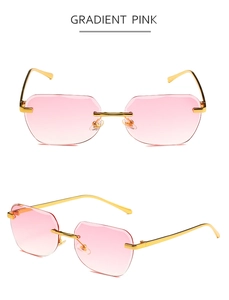 Detail view of rimless square sunglasses with pink gradient lenses and golden metal frame