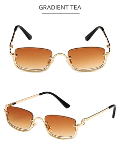 Detail view of small rectangular sunglasses with gradient tea lenses and gold metal frame