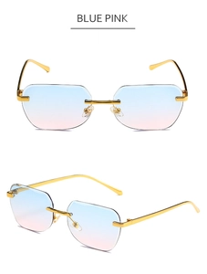 Close-up of rimless square sunglasses with blue-pink gradient lenses and gold metal arms
