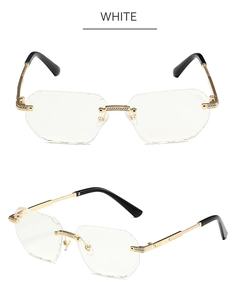 Detail of rimless polygon sunglasses with diamond-cut lens edges and gold metal temples