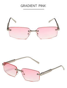 Macro detail of gradient pink rimless sunglasses featuring pyramid-textured metal temples