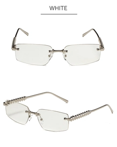 Detail view of rimless rectangle sunglasses with silver studded temples in white color