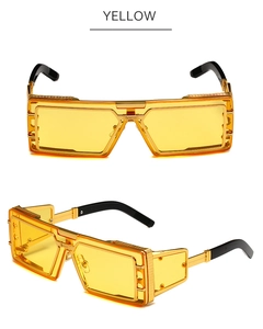 Detail of steampunk sunglasses with yellow transparent lenses and gold metal frame