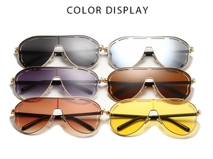 Multi-color selection of oversized shield sunglasses with hollow gold metal frames