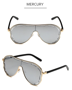 Detail of shield sunglasses with silver lenses, gold frames and cutout edge design