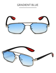 Détail de lunettes de soleil en métal à verres dégradés bleus et monture à double pont