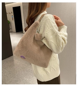 Detailed macro view of the coffee brown plush tote bag with a soft faux fur texture