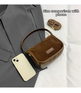 Detailed view of brown PU leather leopard print bag size comparison with a smartphone