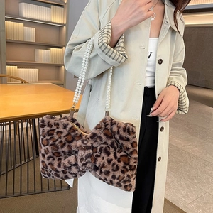 Leopard print faux fur bow shoulder bag with elegant double row pearl chain handle
