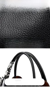 Detail of black pebbled leather texture and handle with geometric silk scarf wrap