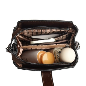 Internal view of the large capacity PU bucket bag with multiple functional compartments