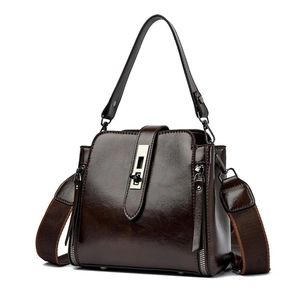 Dark brown high-gloss PU bucket bag with retro metal buckle and adjustable straps