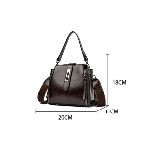 Detail view of dark brown PU leather bucket bag showing 20x18x11cm size and metal lock