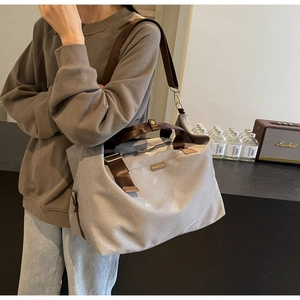 Contrast color canvas travel tote bag with brown straps for women outdoor fashion