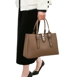 Brown litchi grain PU leather tote bag with silver buckles and large capacity for daily commute
