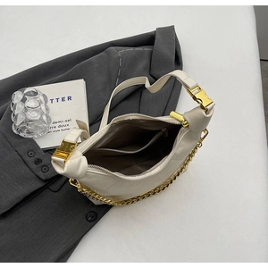 Chic cream leather dumpling bag with gold chain and metal buckle for women's daily use