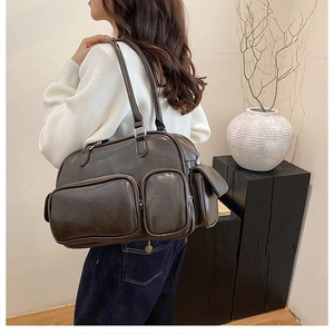 Retro dark brown crossbody bag with multi-pocket design and lychee leather texture