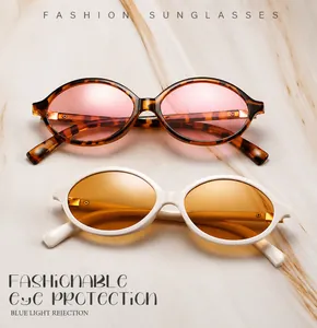 Detail of retro oval frames in tortoiseshell and white with anti-blue light lenses