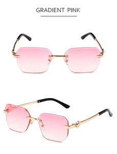Detail of rimless polygon sunglasses with pink gradient lenses and golden metal frames