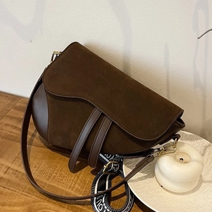 Classic dark brown saddle bag with smooth leather finish and stylish wide shoulder strap