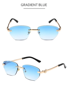 Vue détaillée de lunettes de soleil polygonales sans monture avec verres dégradés bleus et or