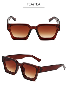 Vue détaillée de lunettes de soleil carrées thé avec monture ambre translucide