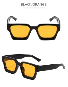 Vue détaillée des lunettes de soleil carrées à monture noire et verres orange vifs