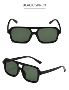 Detail of square pilot sunglasses with double bridge and dark green lenses